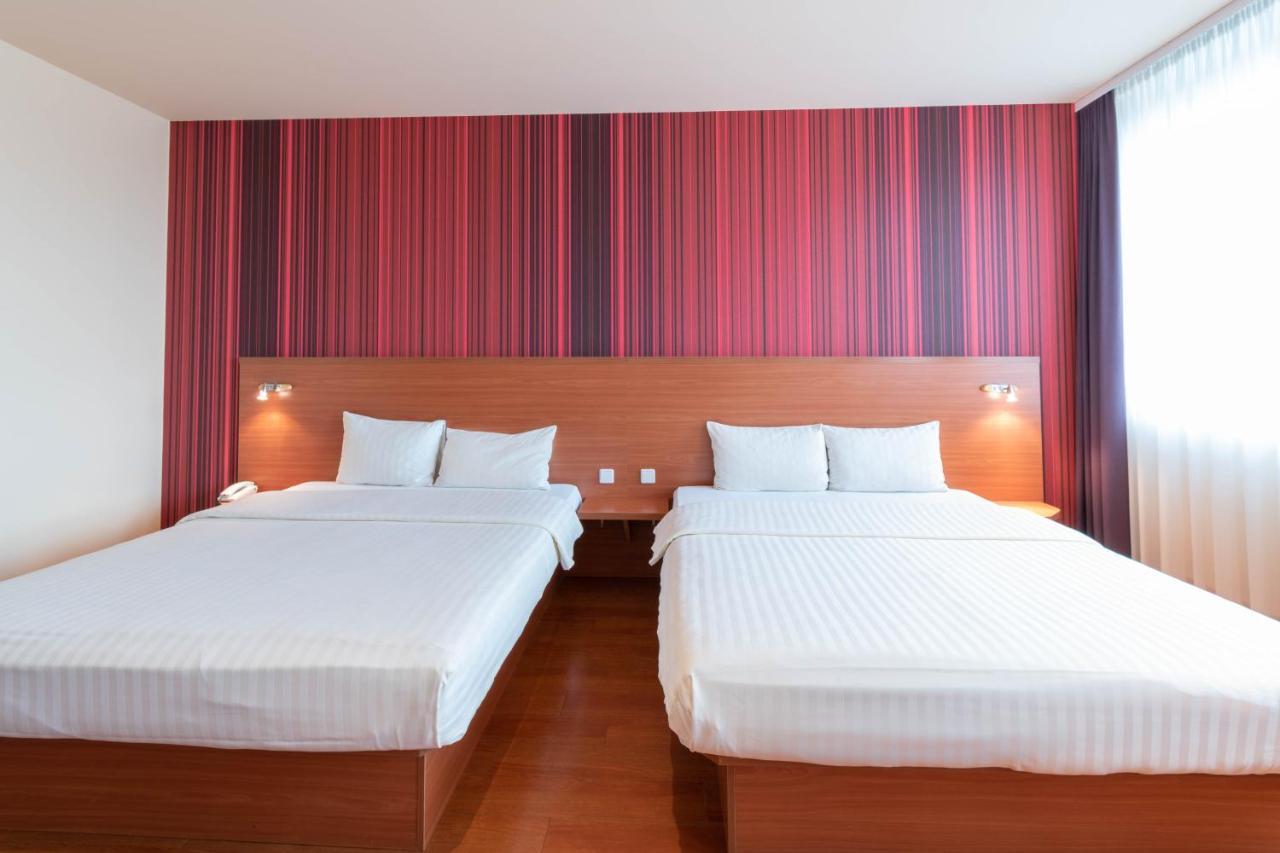 Tweepersoonskamer met 2 Aparte Bedden