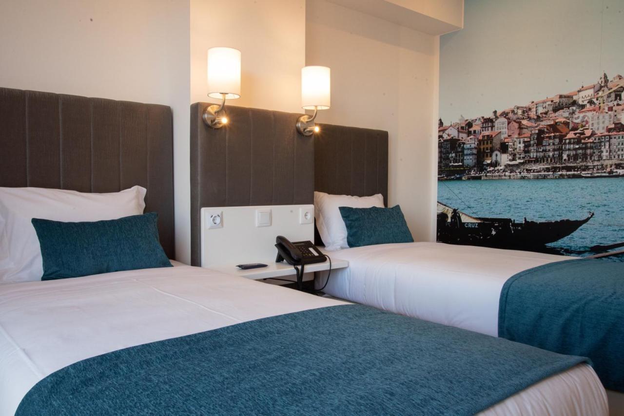 Quarto com 2 Camas de Solteiro e Varanda