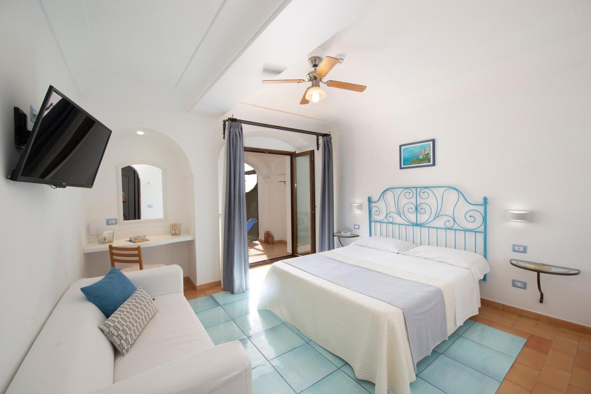 Habitación Doble Deluxe con patio y vistas al mar