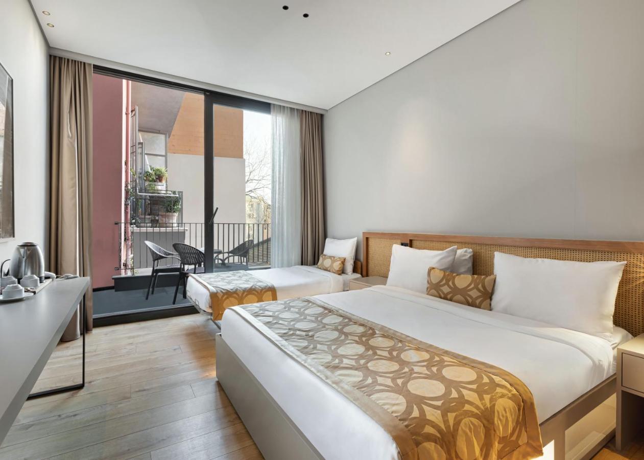 Chambre Triple avec Balcon