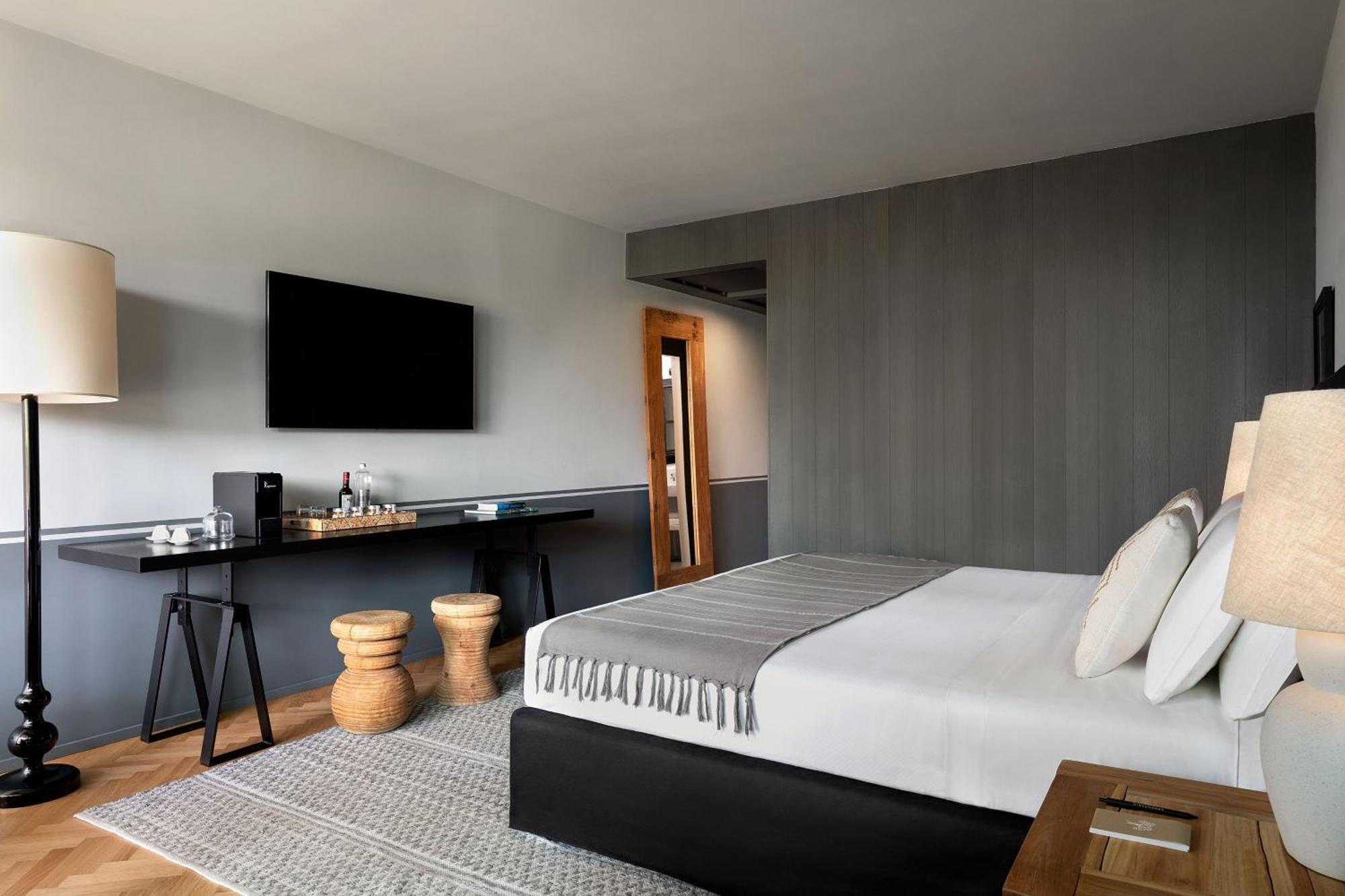 Junior Twin Suite with Balcony and Garden View