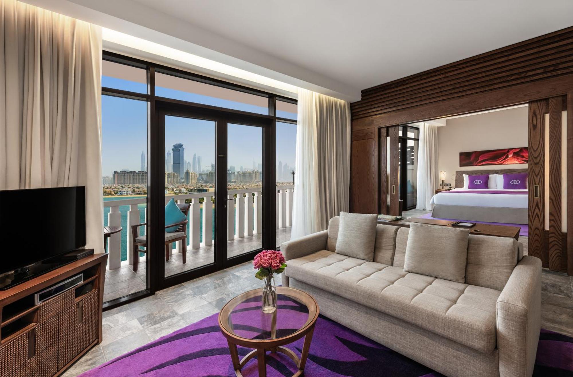 Suite Lit King-Size Prestige avec Canapé-Lit et Vue sur Mer - Accès au Club