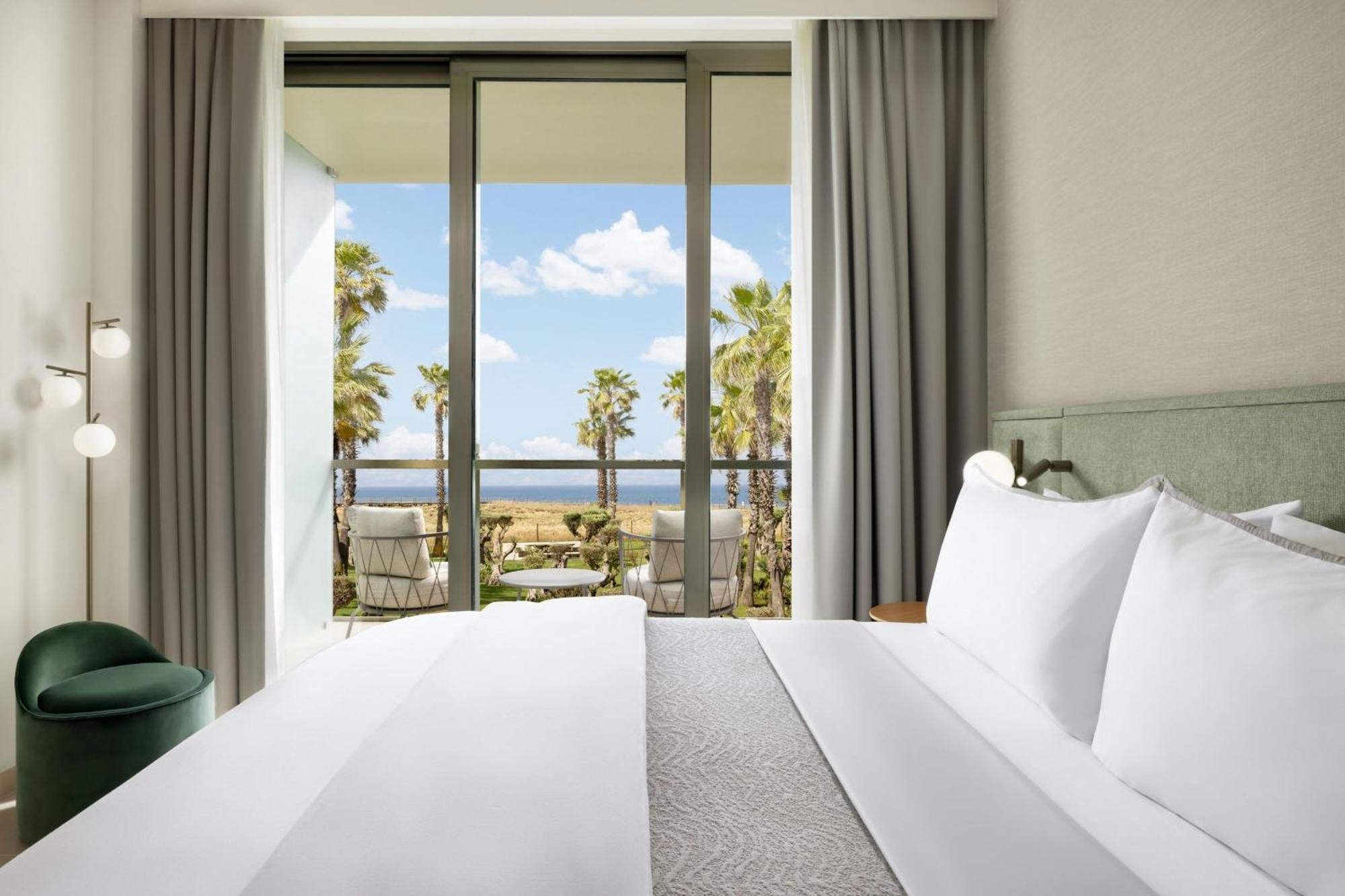 Chambre Lit King-Size de Luxe avec Balcon - Vue sur Mer