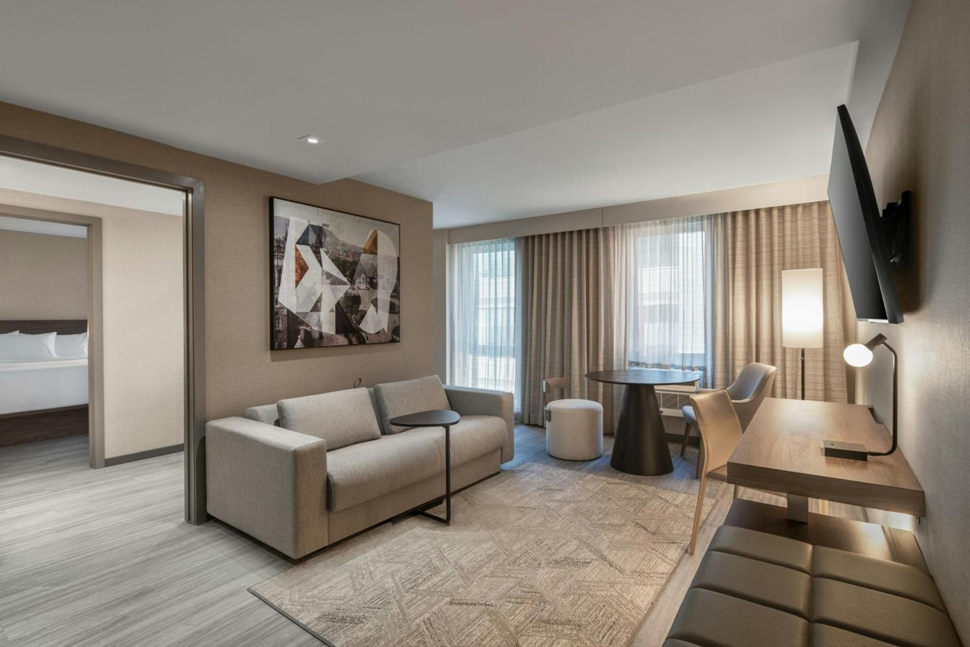 Chambre de Luxe avec 2 Lits Queen-Size et 1 Canapé-Lit
