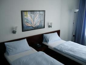 Tweepersoonskamer met 1 of 2 Bedden