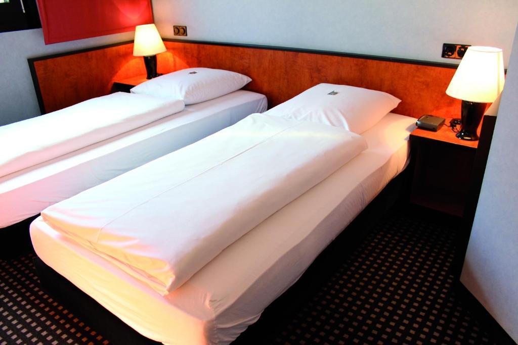 Tweepersoonskamer met 2 Aparte Bedden