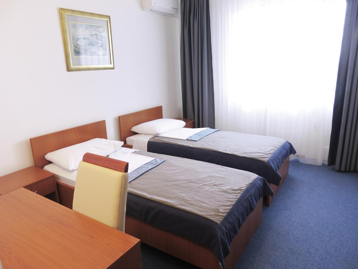 Quarto Duplo ou Twin Standard com Varanda e Vista Cidade