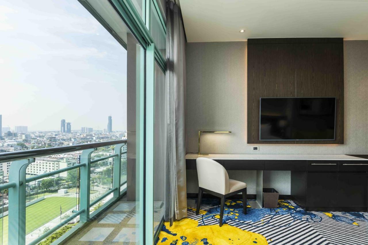 Habitación Deluxe Grand con cama extragrande y vistas a la ciudad